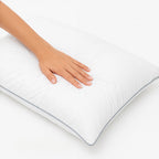 White pillow with a hand on it, branded 'Razzai'.